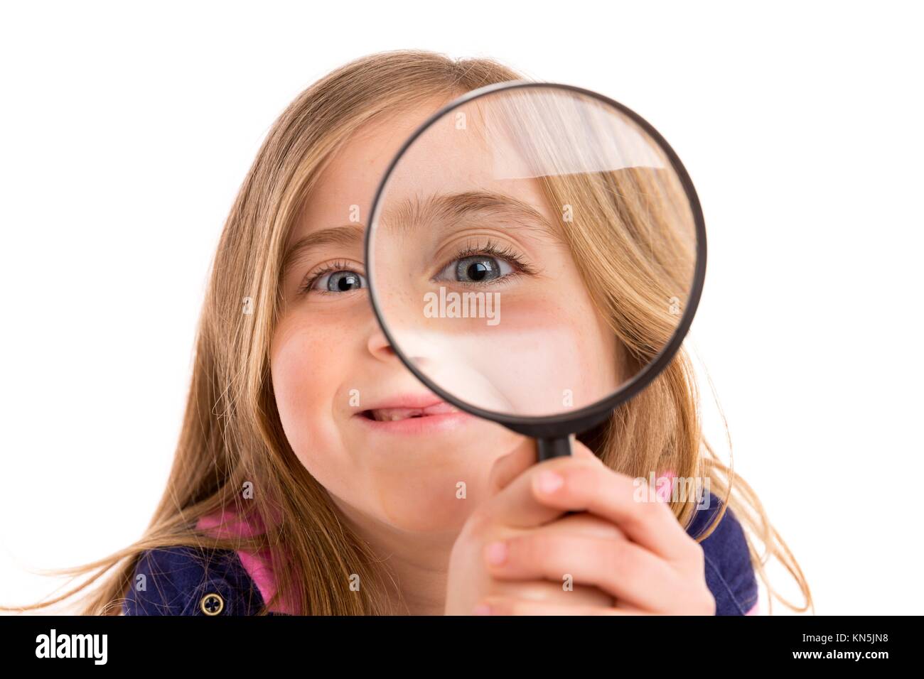 Blond indented girl with eye in magnifying glass funny expression on