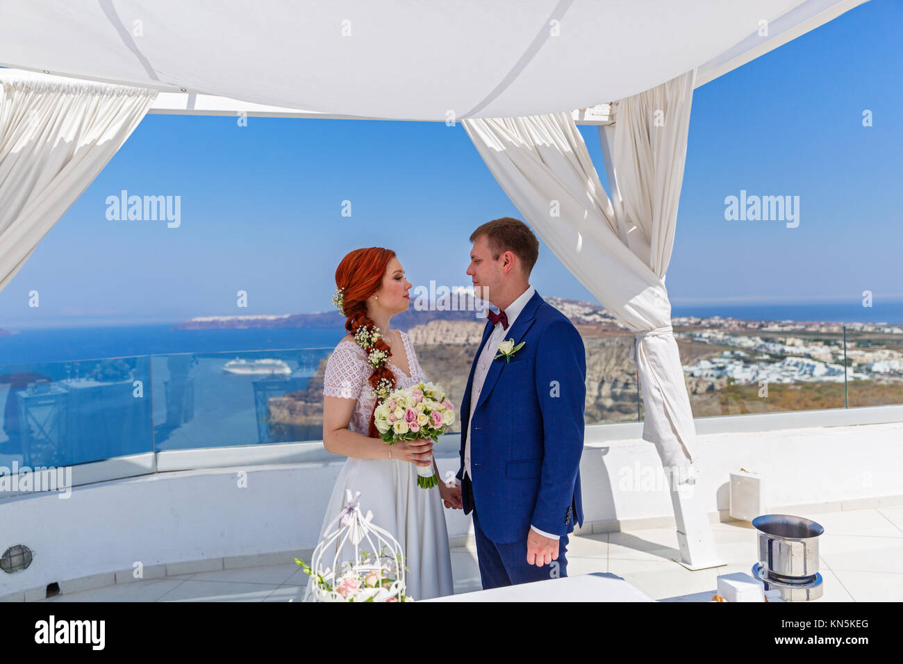 Wedding ceremony couple in Greece, island of Santorini Stock Photo - Alamy