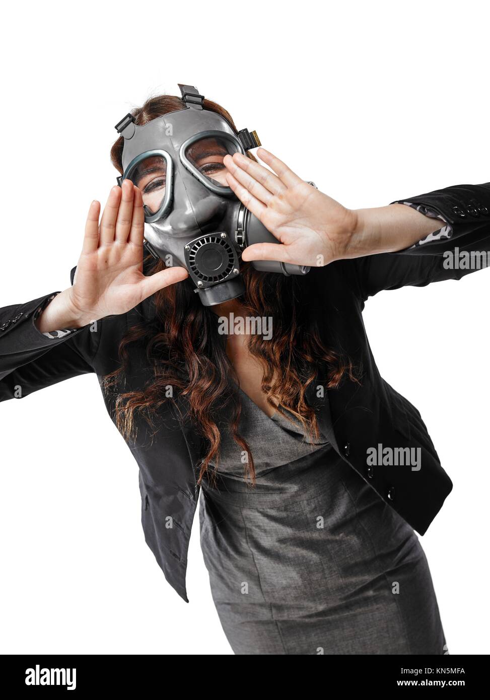 Business looking young adult woman wearing a personal gas mask and she shout - white background. Stock Photo