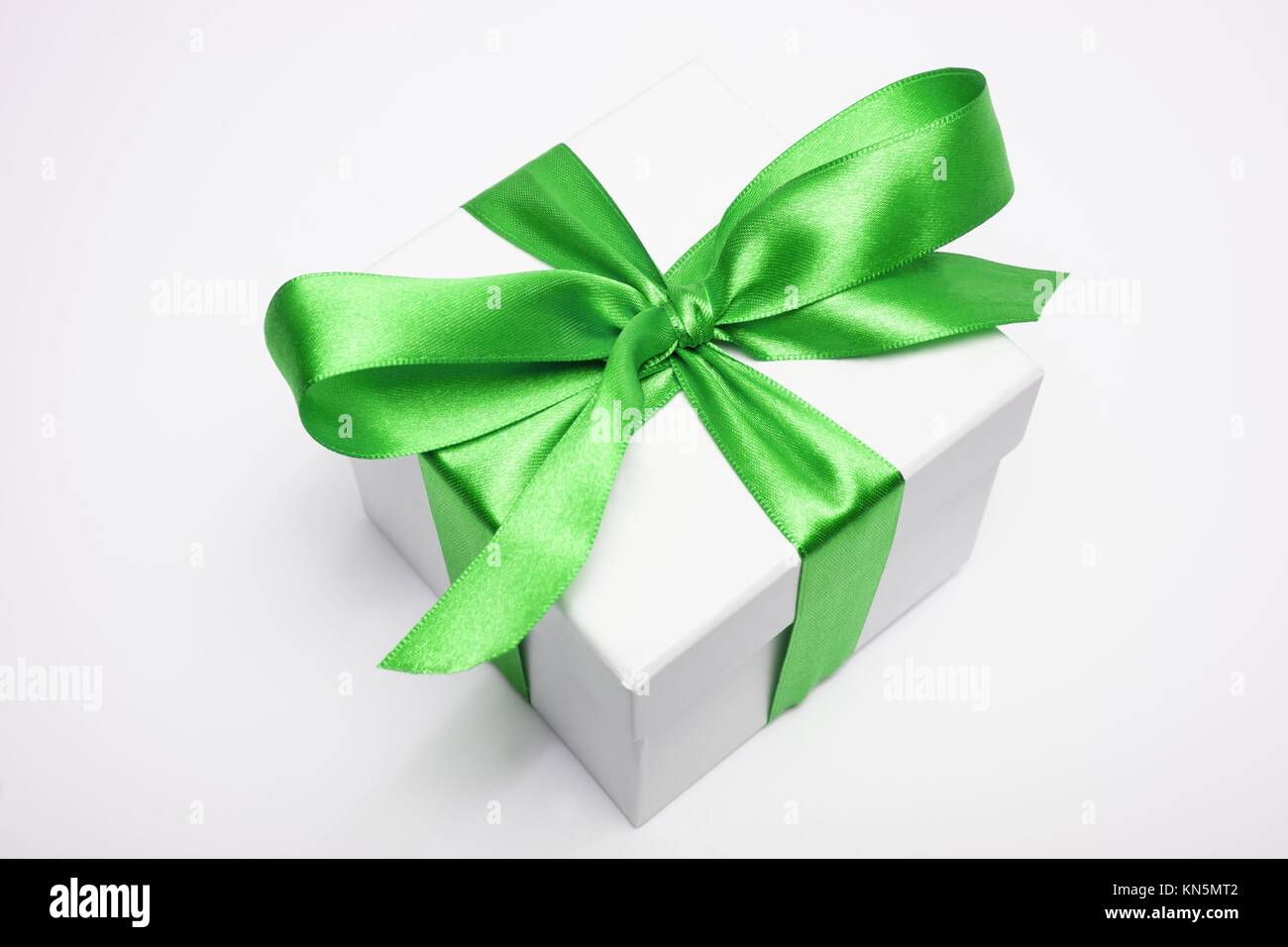 gift box with green loop on white background. Stock Photo
