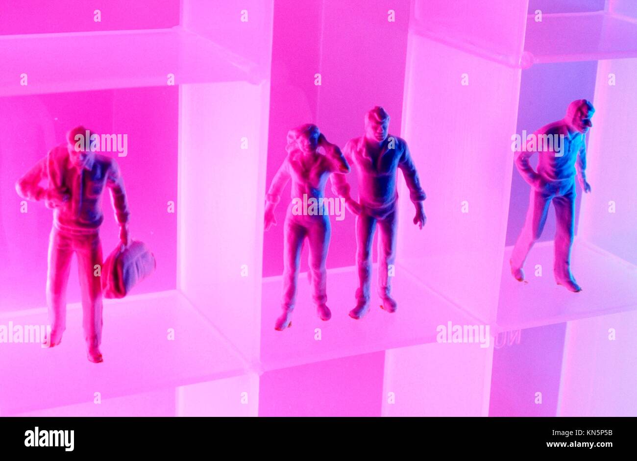 Figures on shelf Stock Photo Alamy