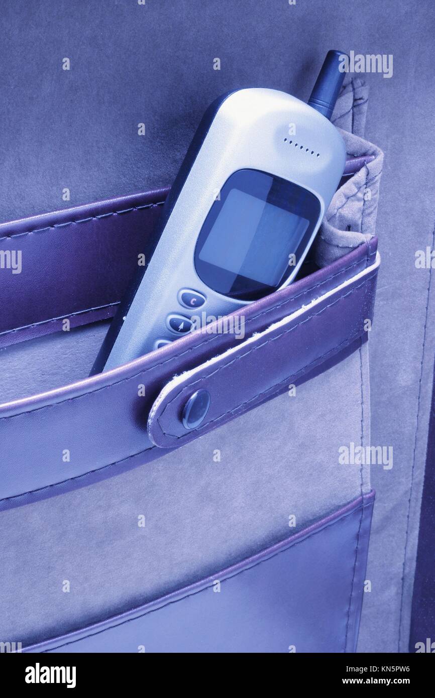 Mobile phone in briefcase Stock Photo Alamy