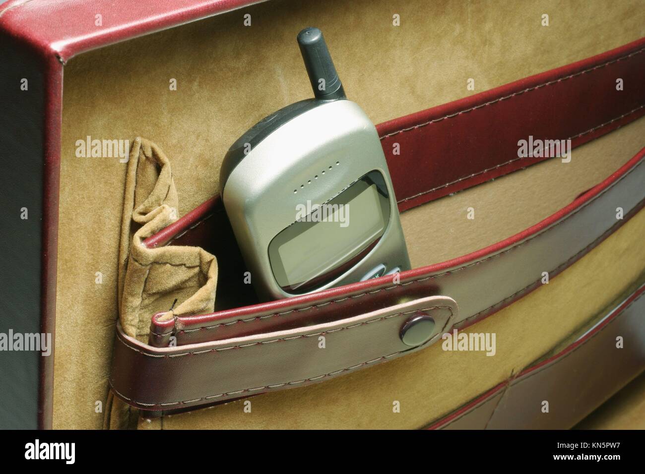 Mobile phone in briefcase Stock Photo Alamy