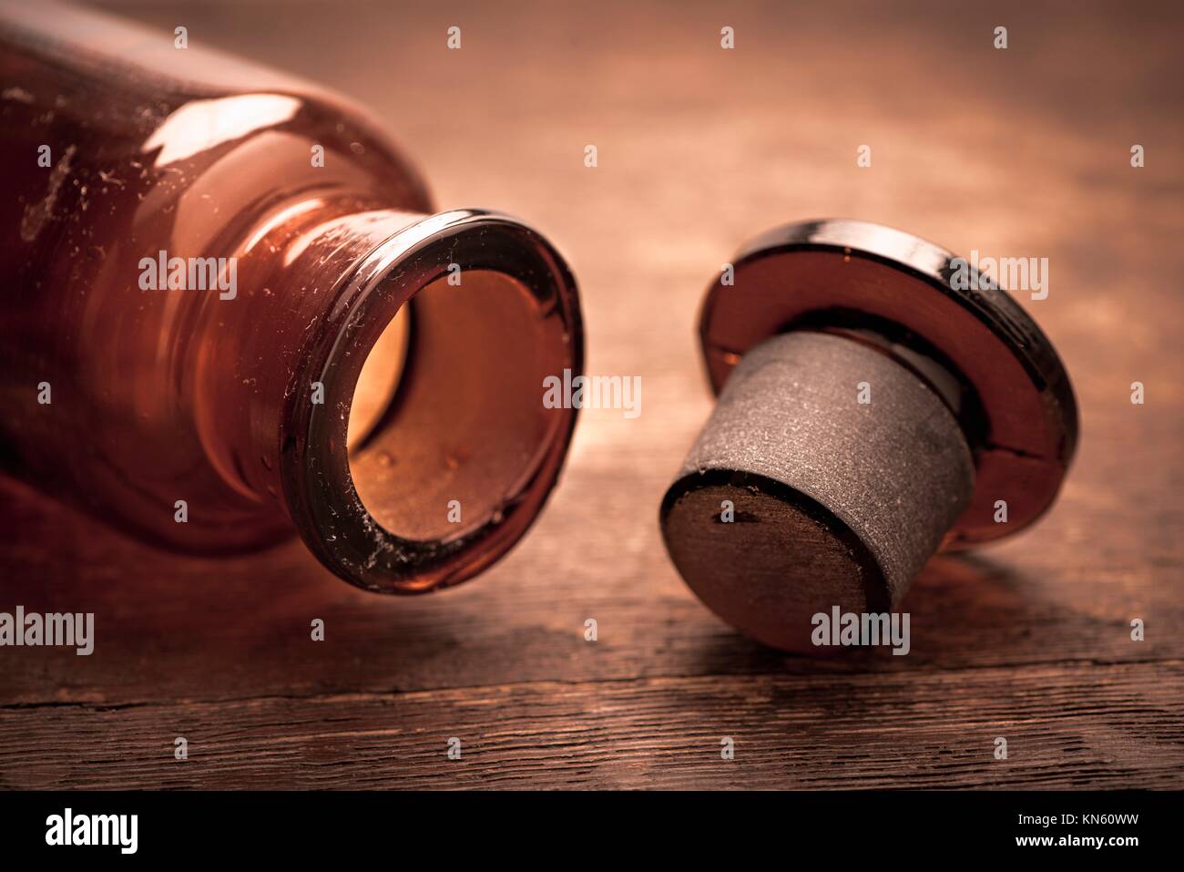 Old fashioned brown glass bottle. Conceptual image of historical