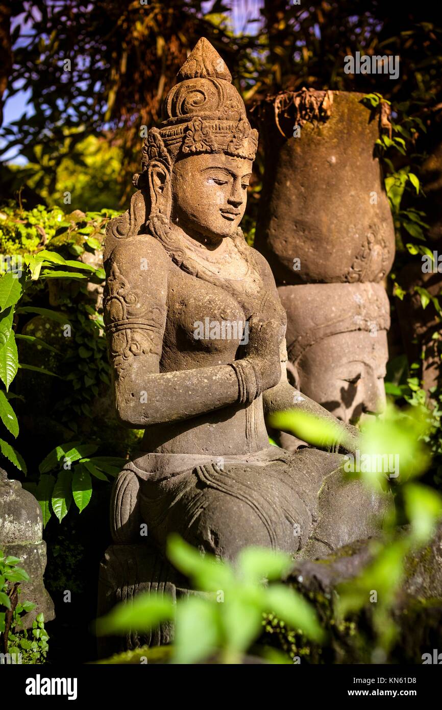 The old stone Buddha statue. Indonesia, Bali Stock Photo Alamy