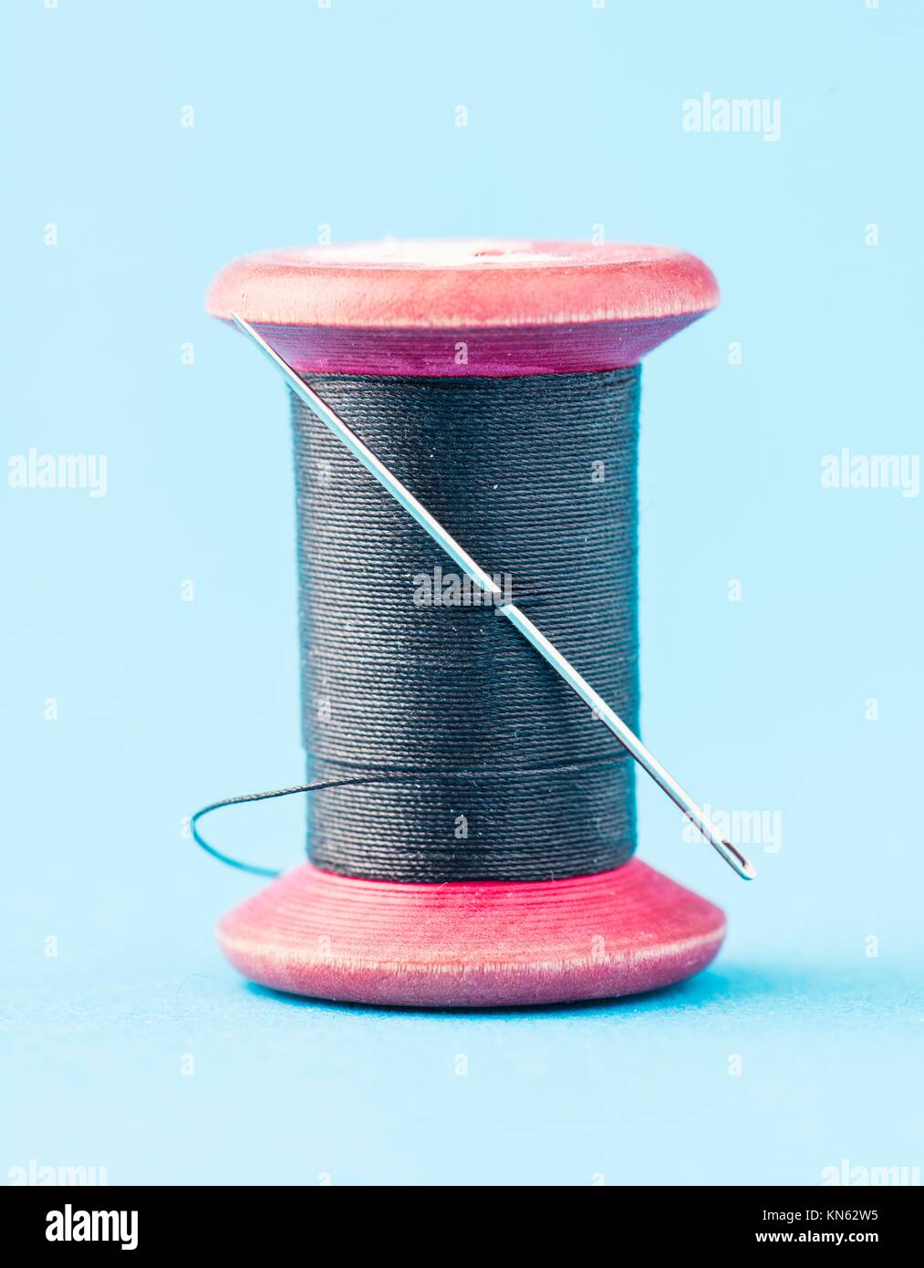 Closeup of thread used for sewing and needle Stock Photo Alamy