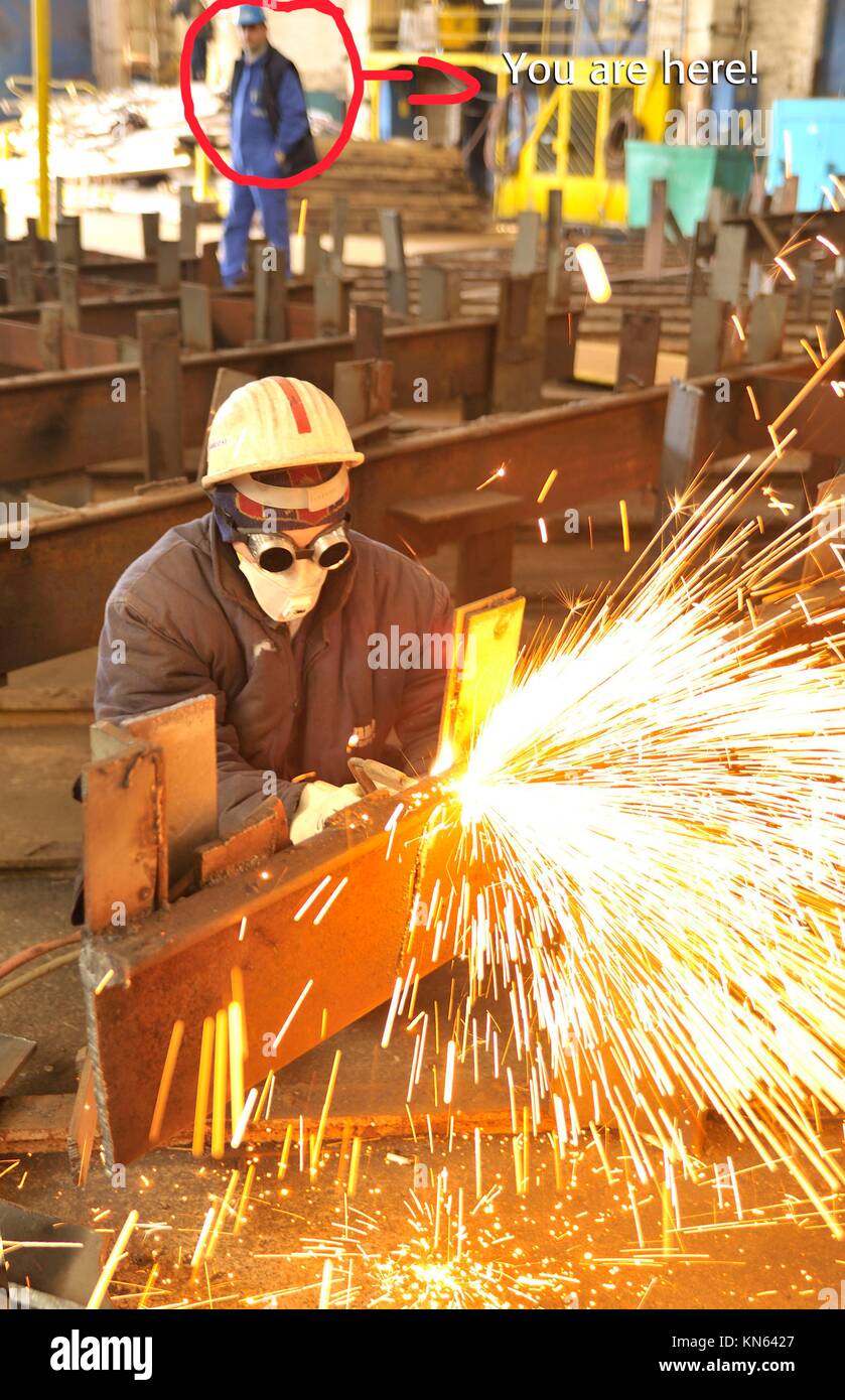 worker using torch cutter to cut through metal Stock Photo Alamy