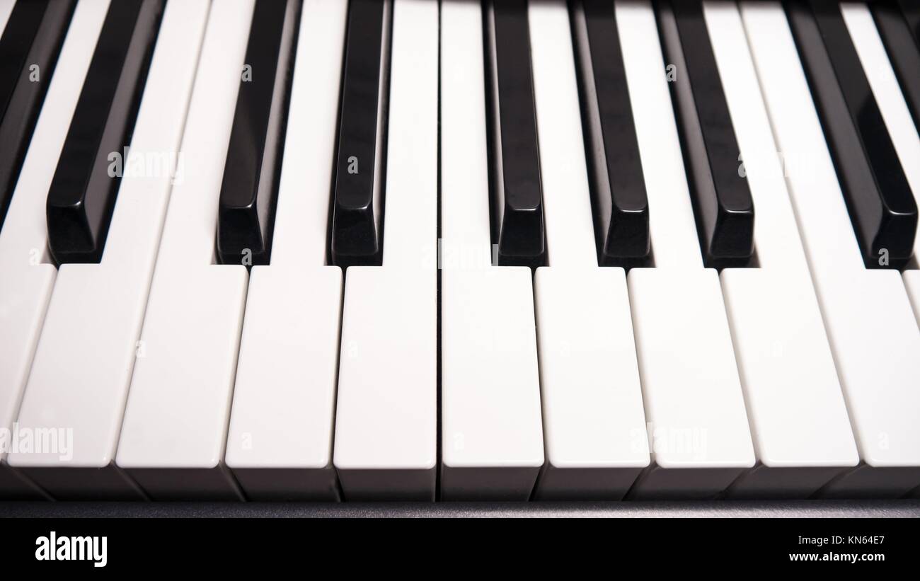 background with piano keys, closeup Stock Photo - Alamy