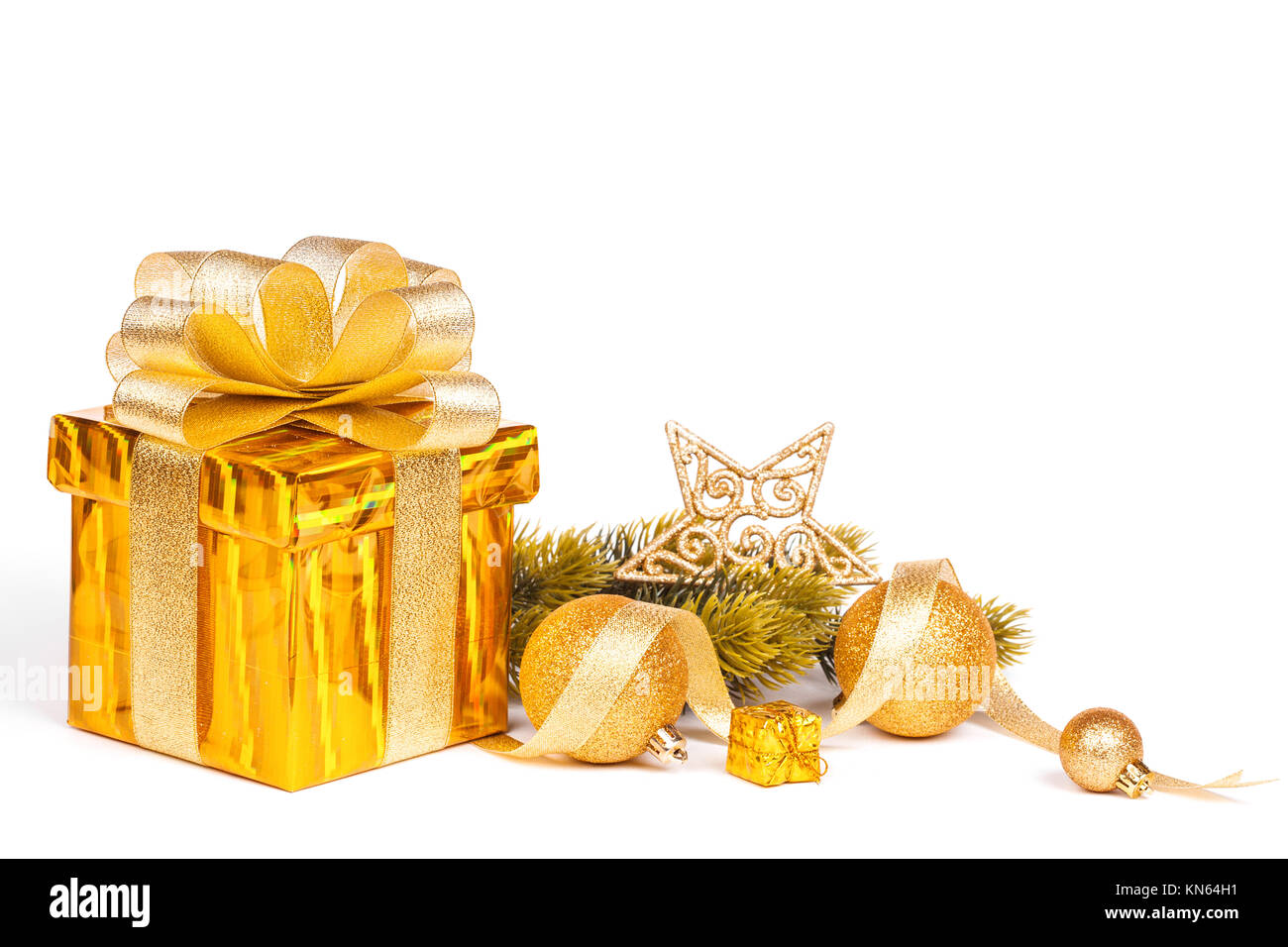 Gold gift and christmas decoration box isolated on white background Stock Photo