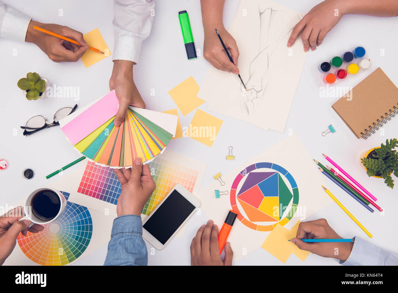 Concept of designer teamwork. Group of business people planning for a ...