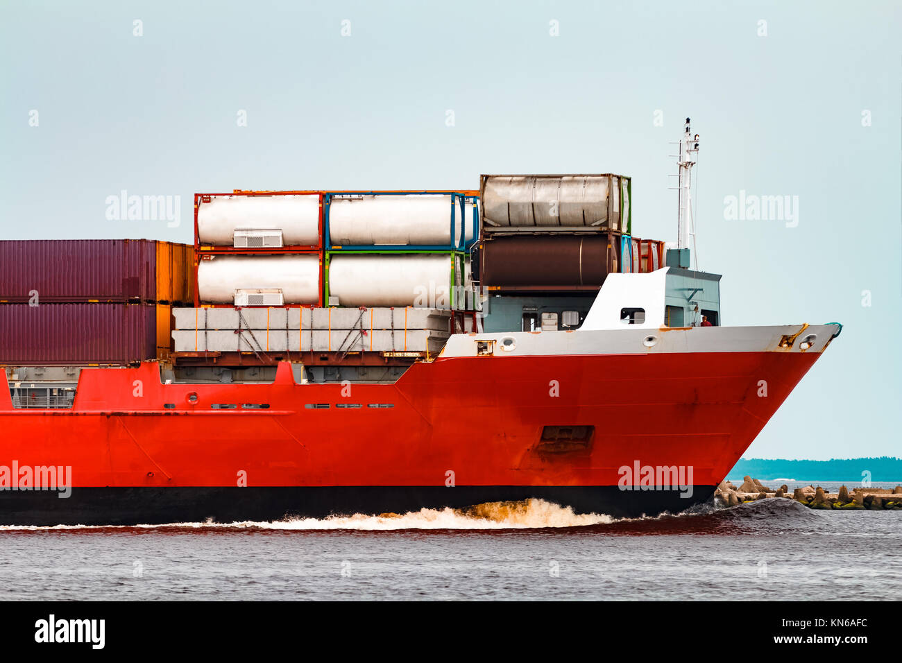 Red container ship. Logistics and production export Stock Photo - Alamy