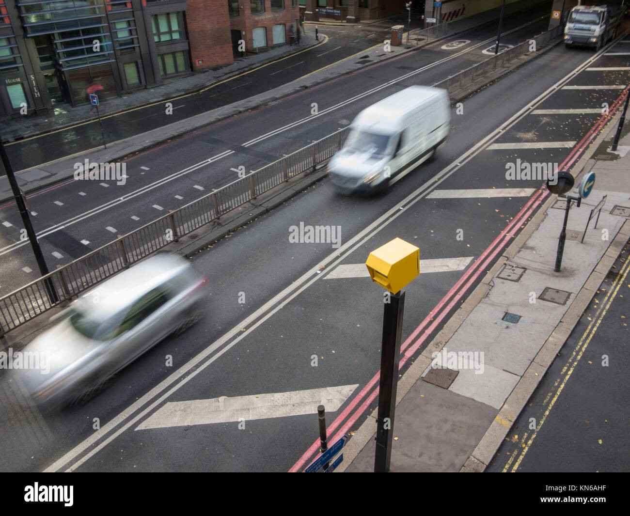 Cars speeding through a speed trap Stock Photo