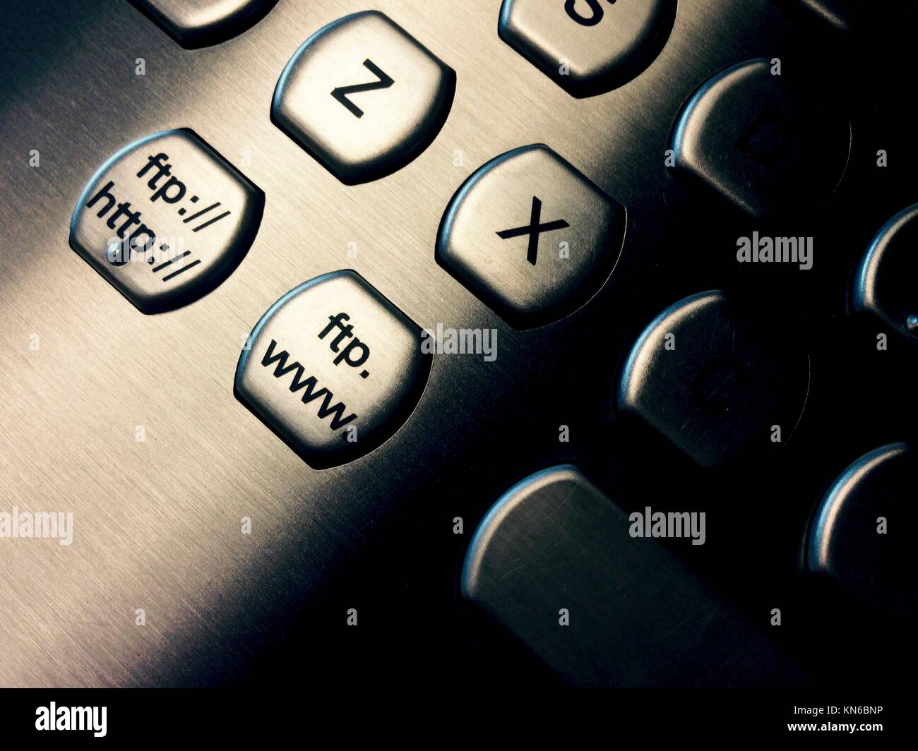 Aluminum pc keyboard closeup with ftp and web keys. Stock Photo