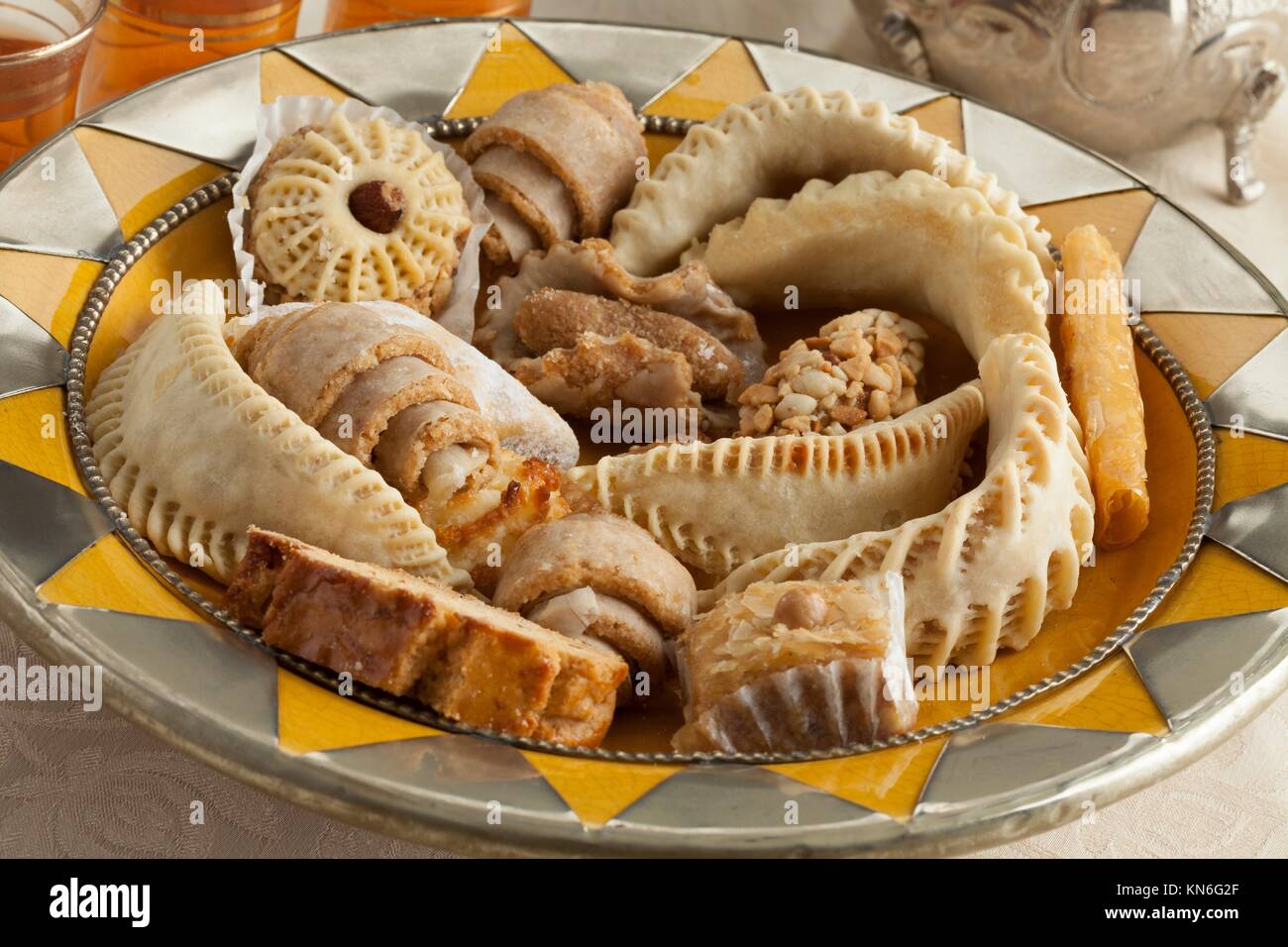 Fresh baked Moroccan cookies on a traditional dish. Stock Photo