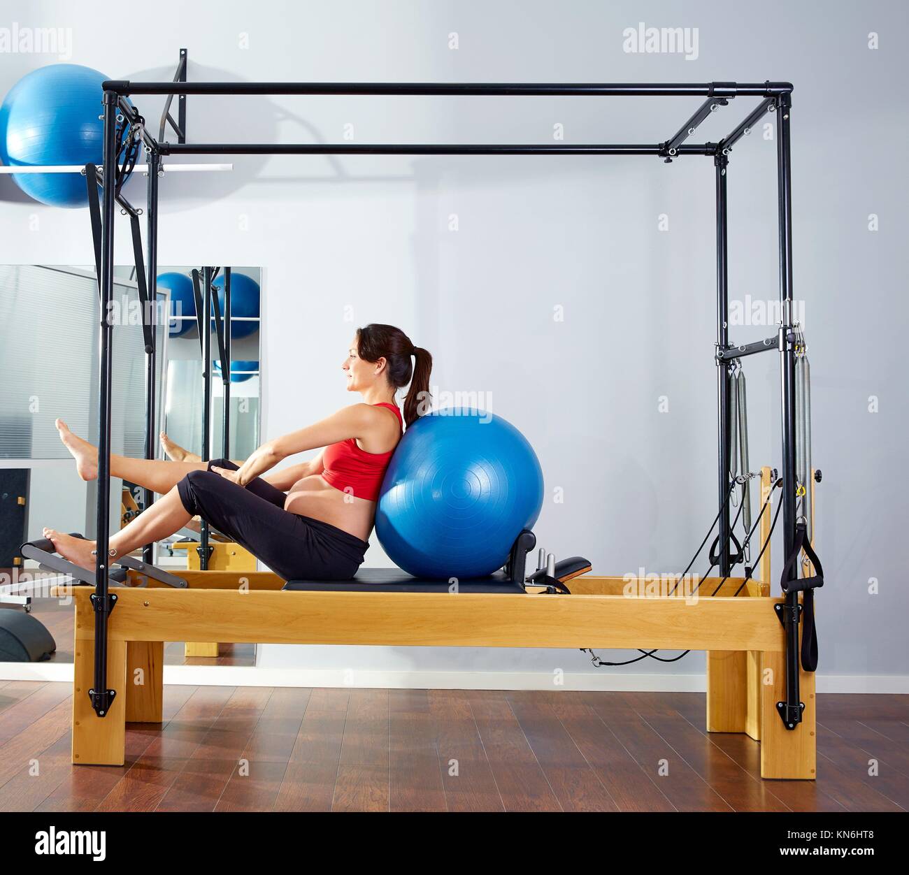 pregnant woman pilates reformer fitball exercise workout at gym Stock Photo Alamy