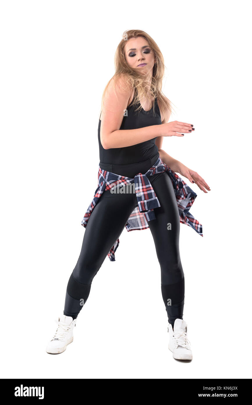 Energetic active woman aerobics dancer doing jazz dance workout