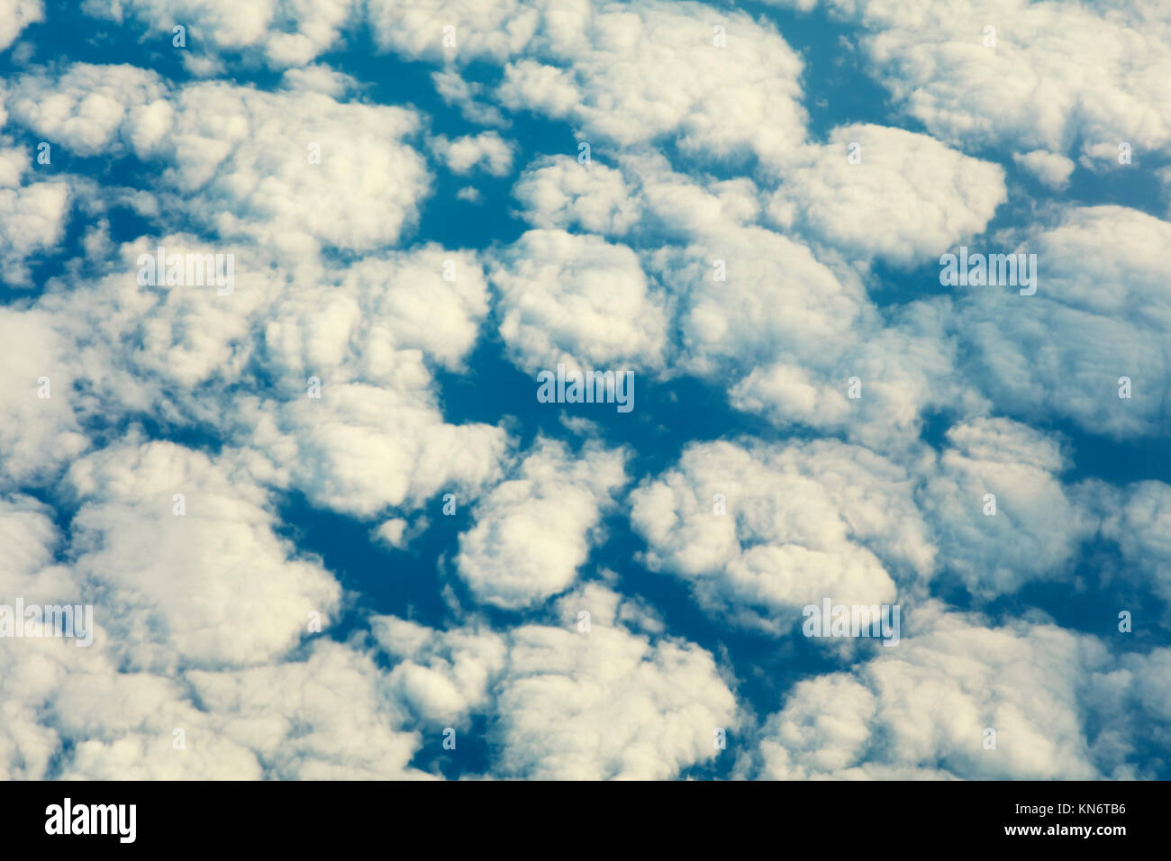 Above the clouds. Blue sky with clouds. Aerial view Stock Photo - Alamy