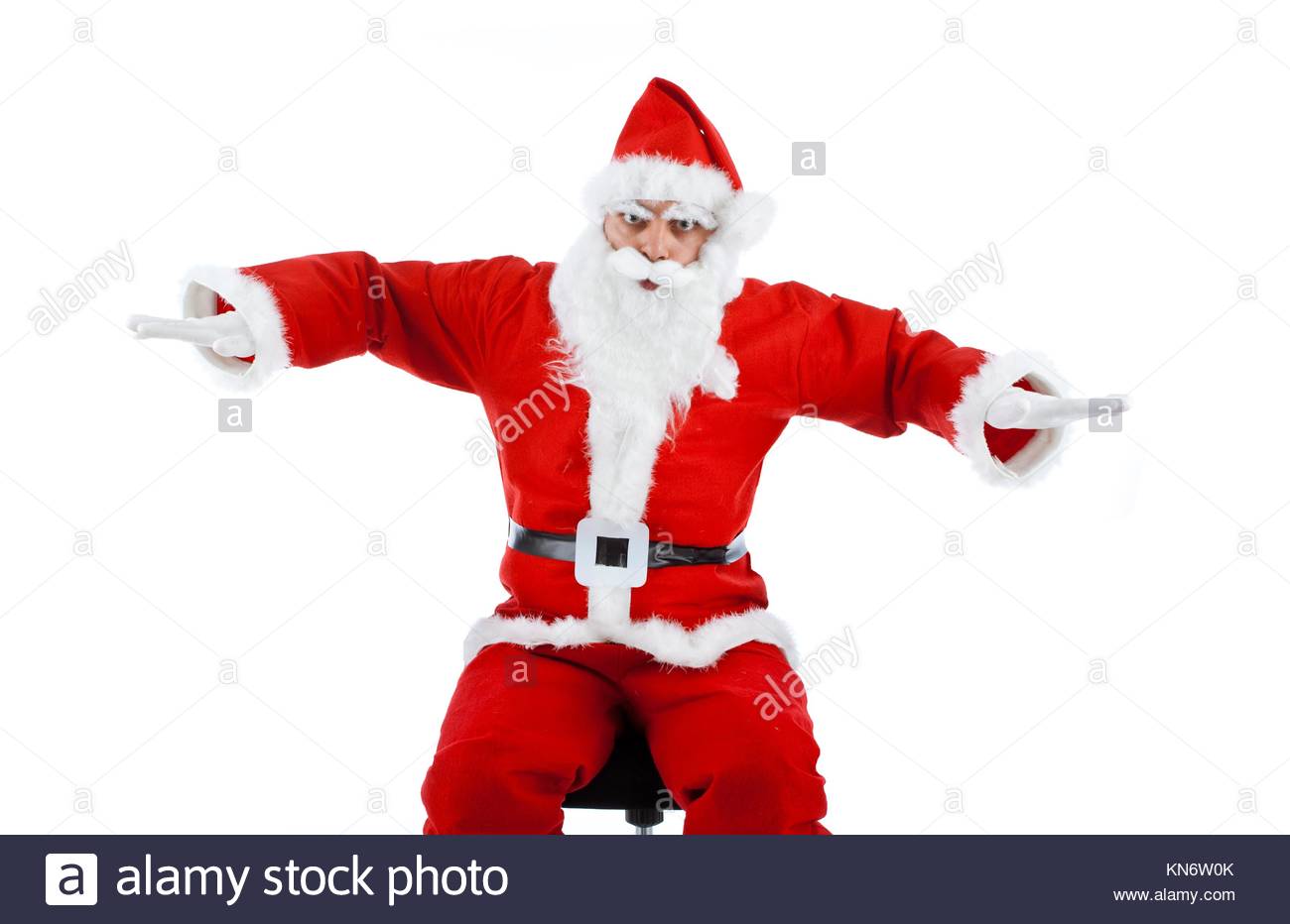 Santa Claus mimics a plane on white background Stock Image