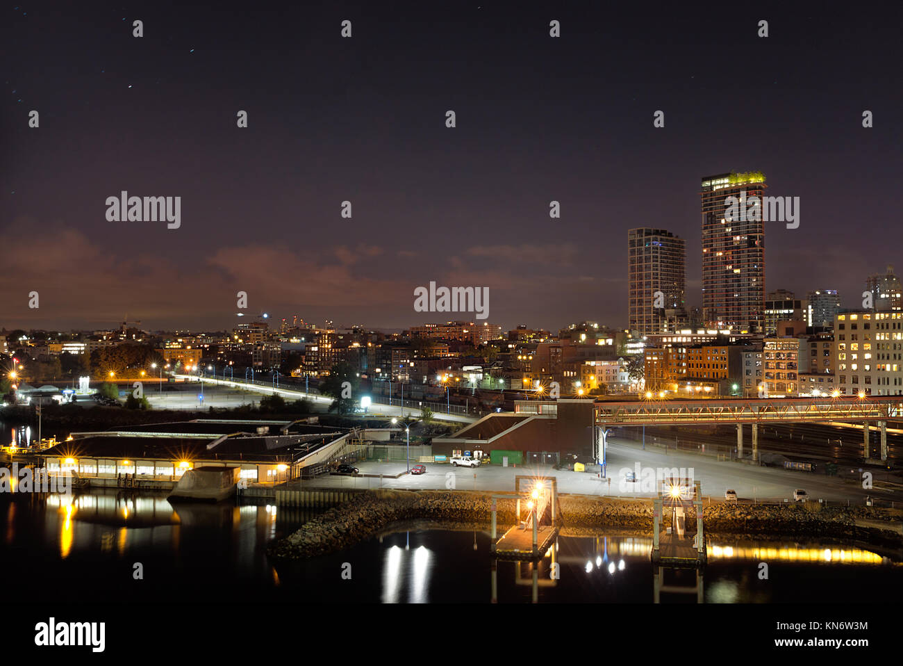 Night view of the Waterfront Road and a pedestrian bridge at the Port Of Vancouver, BC, Canada. Stock Photo