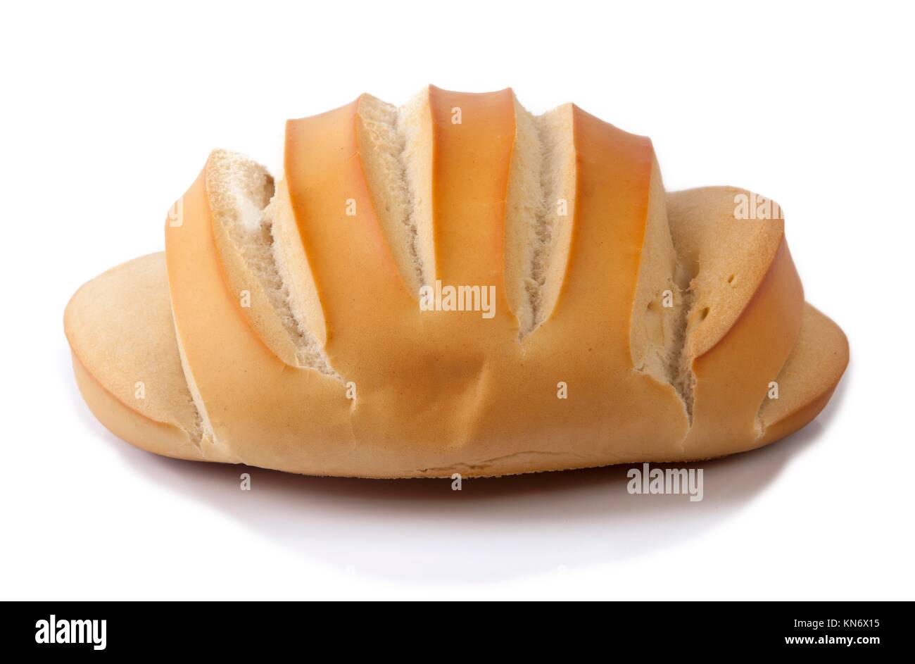 Spanish one kilo bread loaf. Isolated over white background. Side view. Stock Photo
