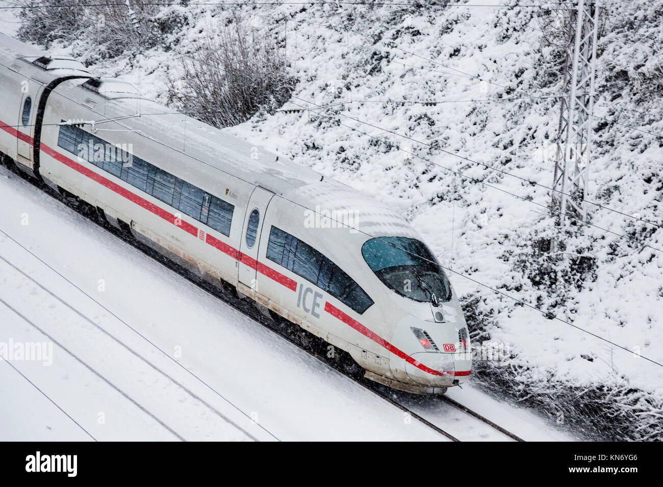 German ICE train in snowy weather, Mülheim an der Ruhr, Germany Stock