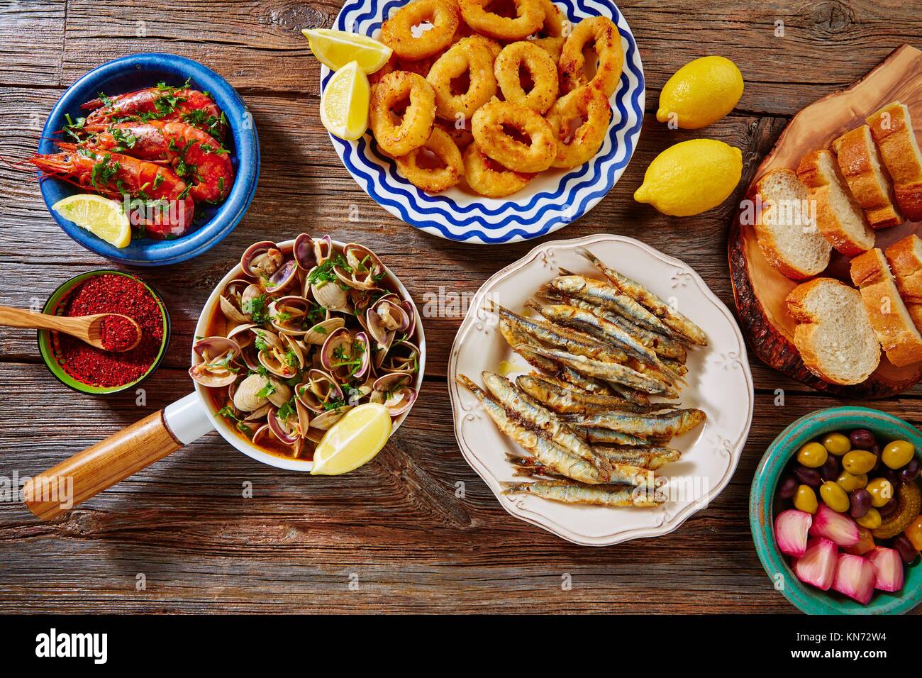 Tapas mix spanish clams olives shrimps calamari romana and fried