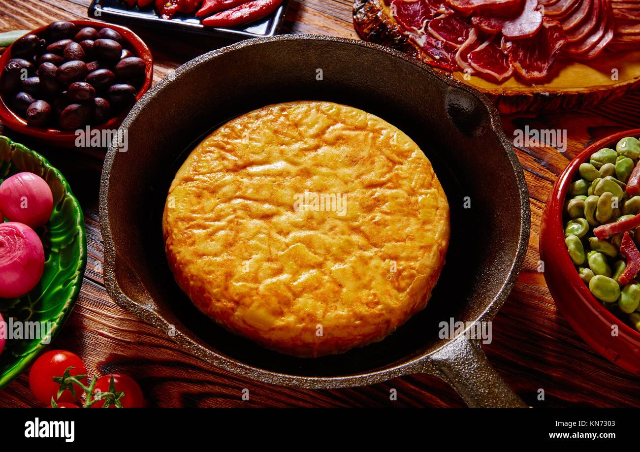 Tapas tortilla de patata potatoes omelette in a pan from Spain. Stock Photo