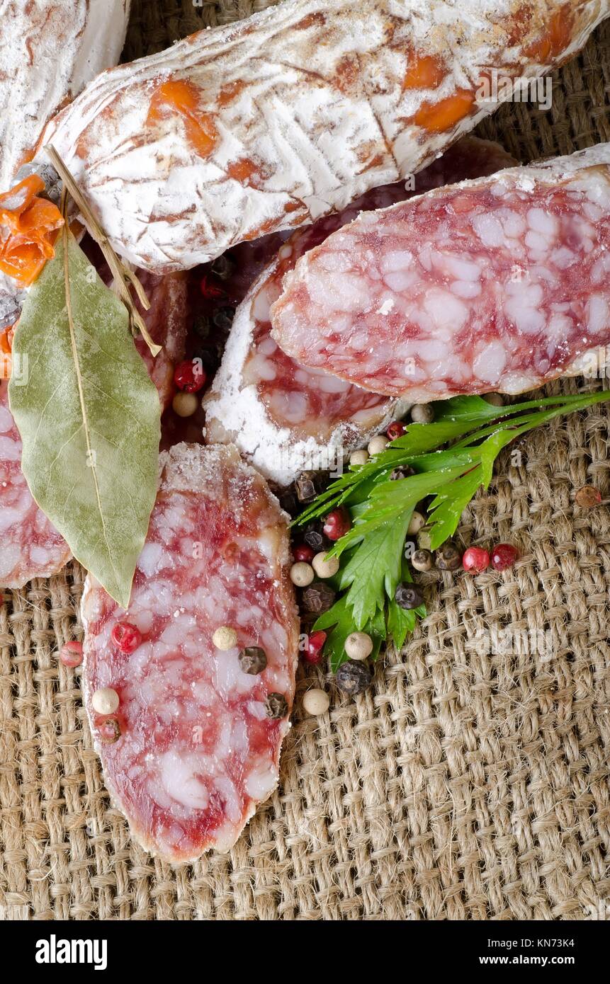 Salami sausage and spices in the tissue Stock Photo Alamy