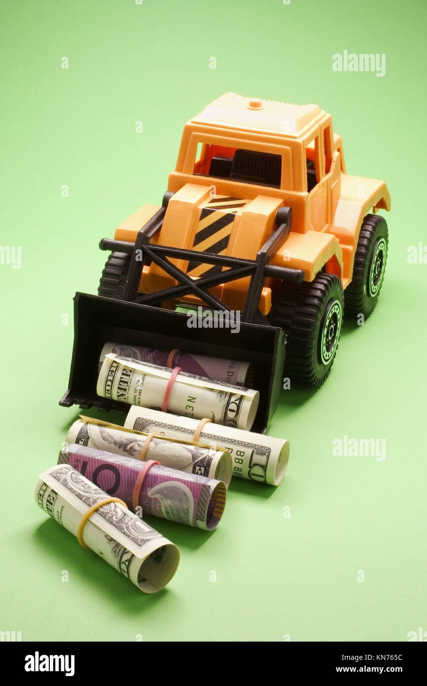 Toy Earth Mover and Notes Stock Photo Alamy