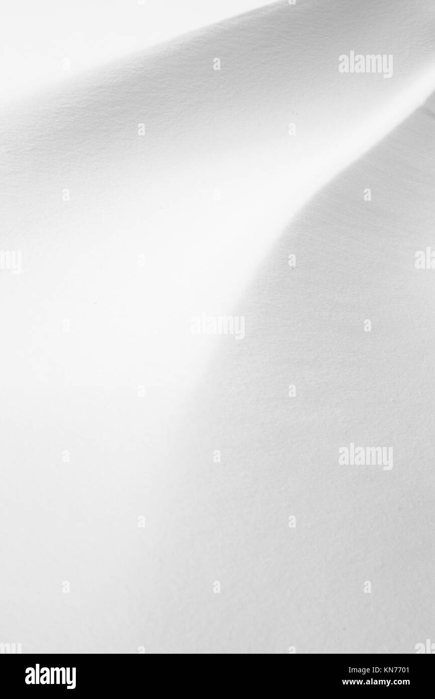 Fresh clean fallen snow with waves lines Stock Photo - Alamy