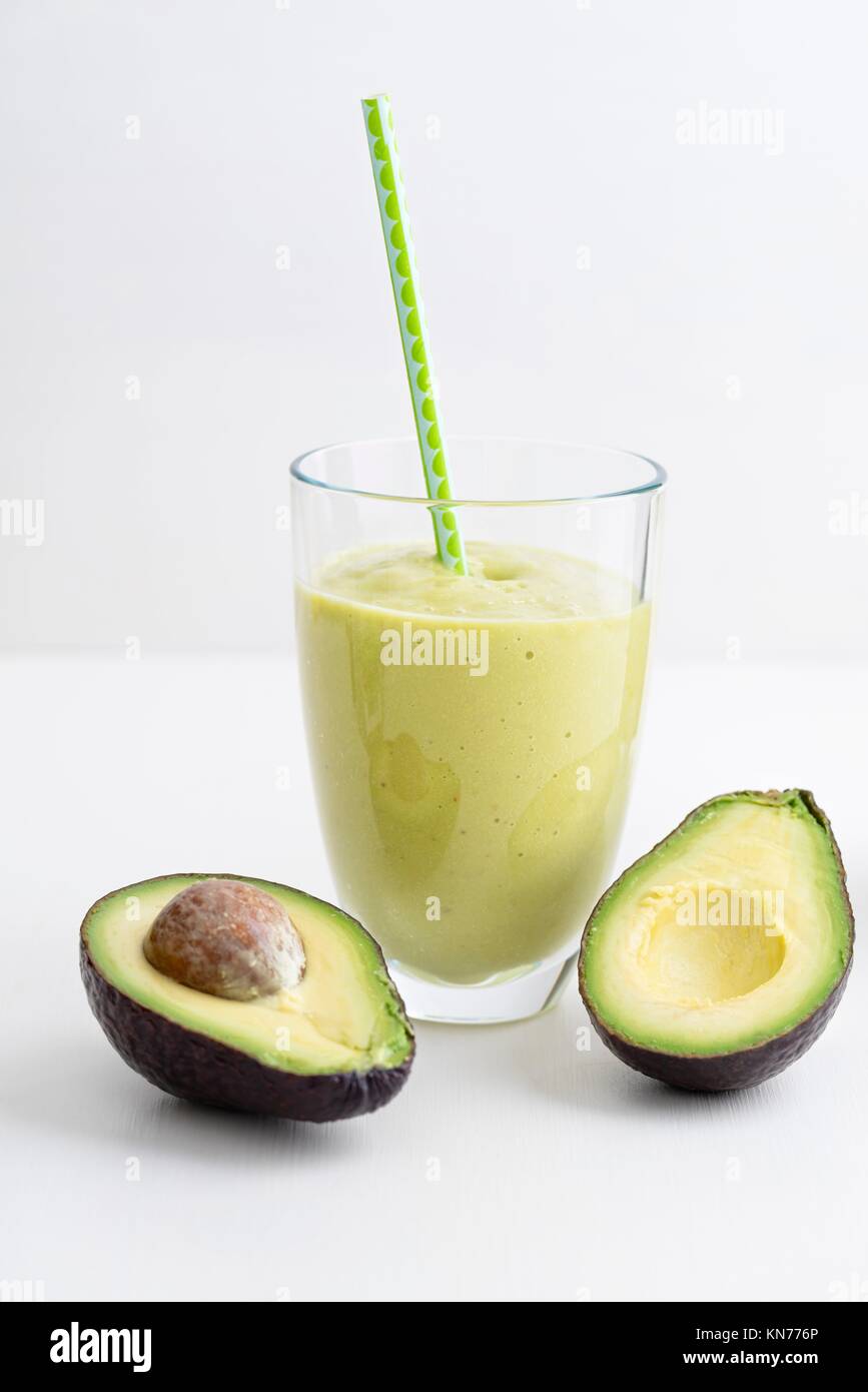 Healthy green smoothie with avocado in a glass Stock Photo Alamy