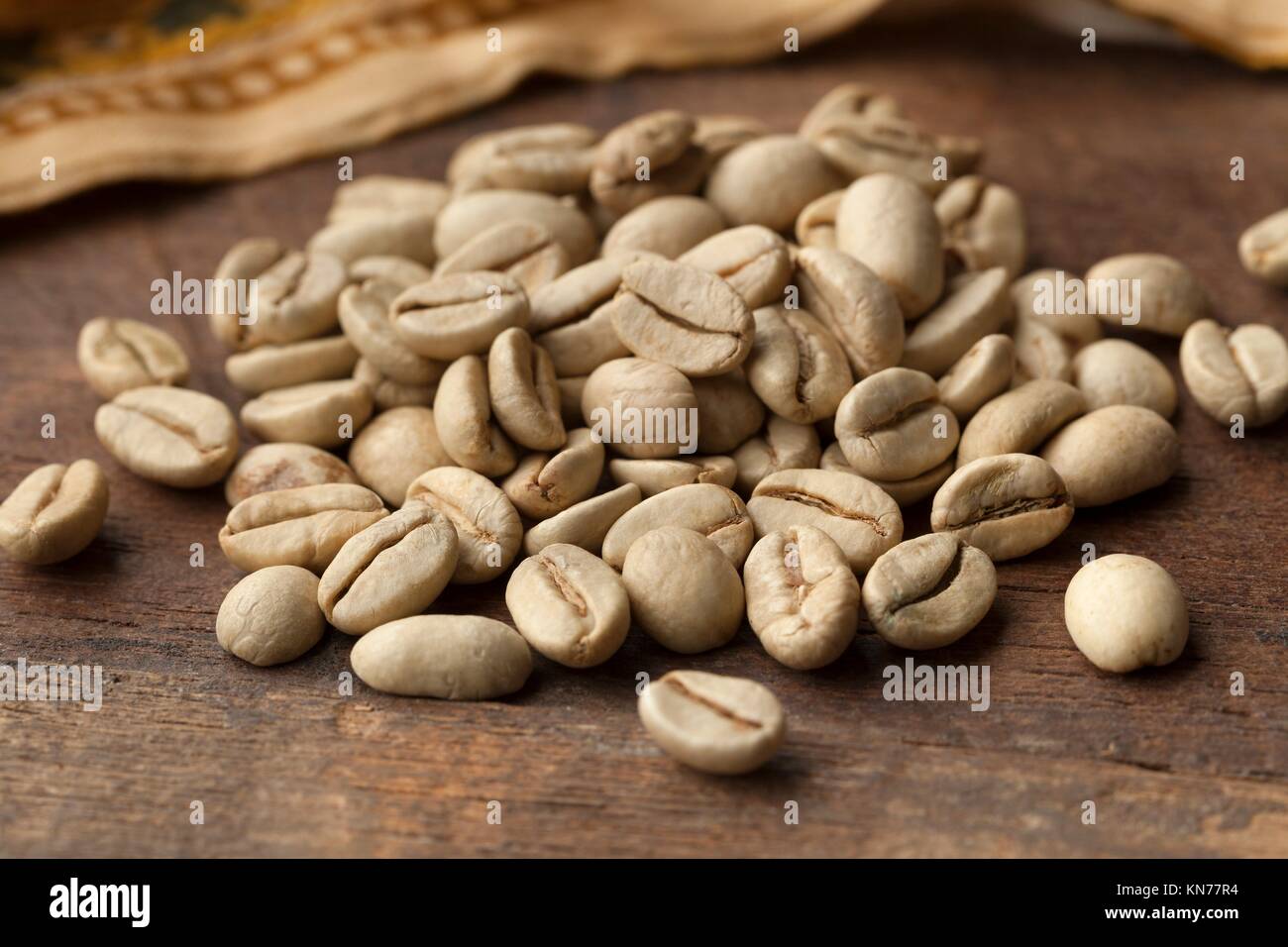 Heap of Indian Malabar green unroasted coffee beans Stock Photo Alamy