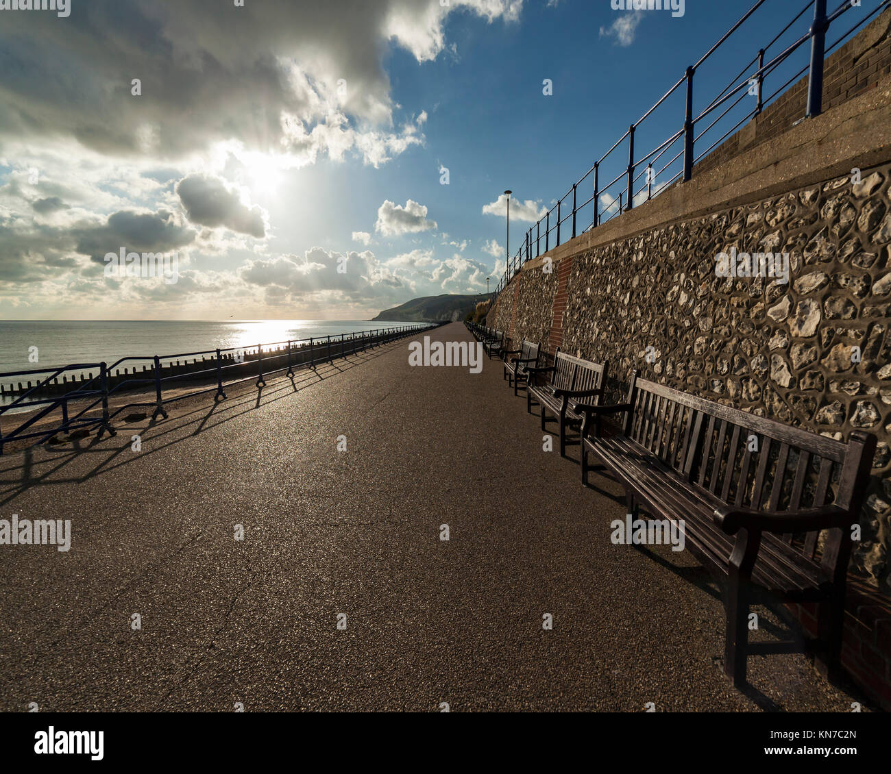Seaside promenade with benches Stock Photo