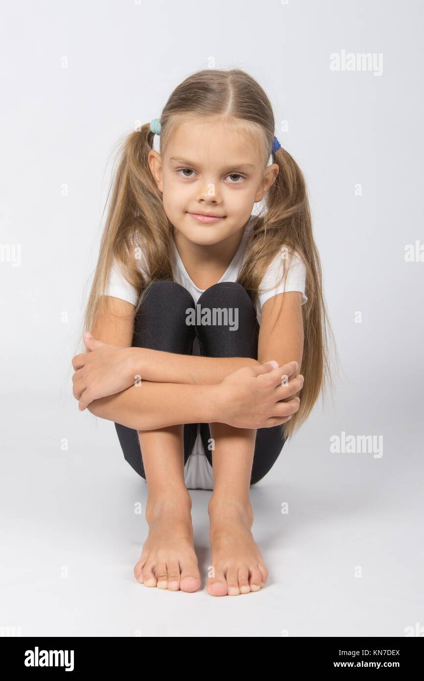 six year old girl aspiring gymnast performs a number of training