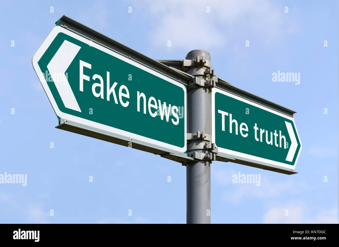 Fake News and The Truth concept sign. Stock Photo