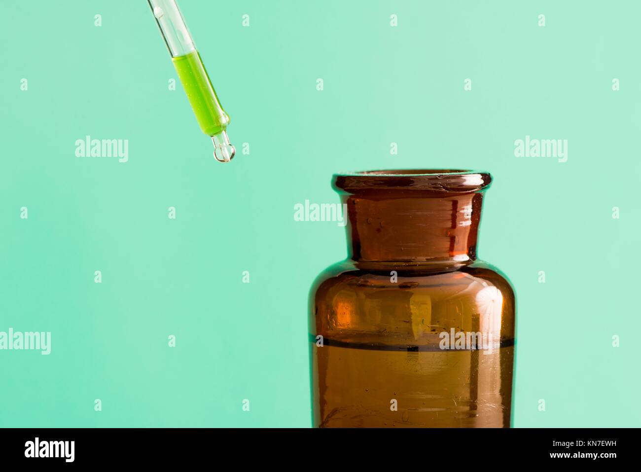 Old style medicine glass bottles. Concept of science research, healthcare and laboratory tests. Stock Photo