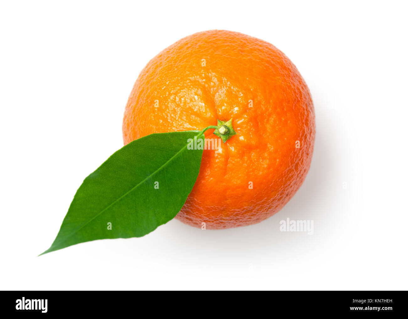 Mandarine, tangerine, clementine with leaf isolated on white background