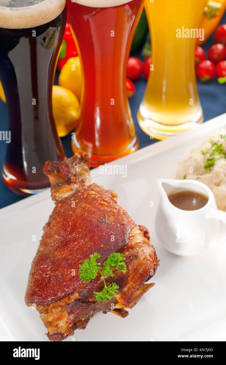 original German BBQ pork knuckle served with mashed potatoes and