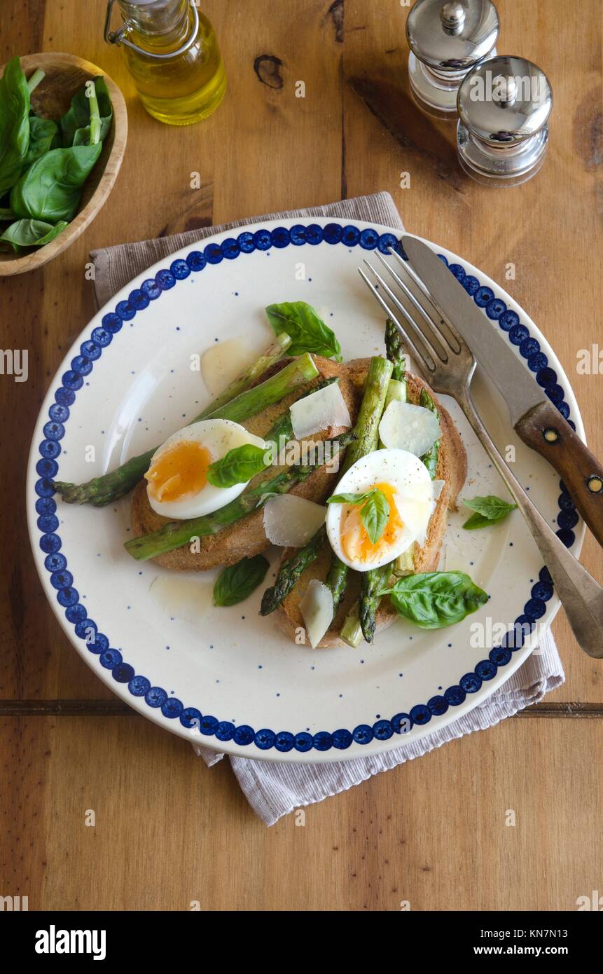 Softboiled egg, asparagus and Pecorino on toast Stock Photo Alamy