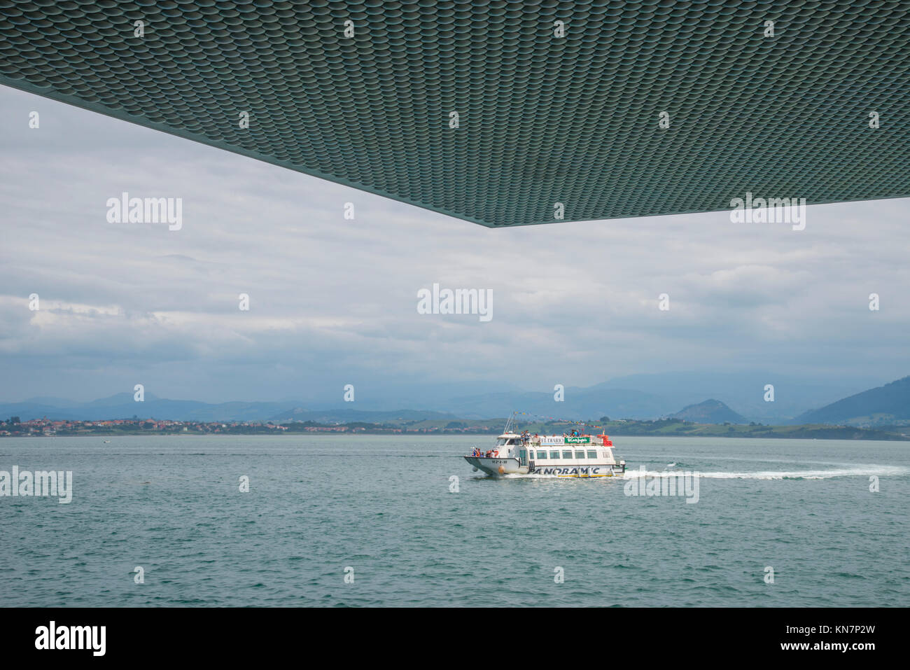 Boat crossing the bay, viewed from Botin Center. Santander, Spain. Stock Photo