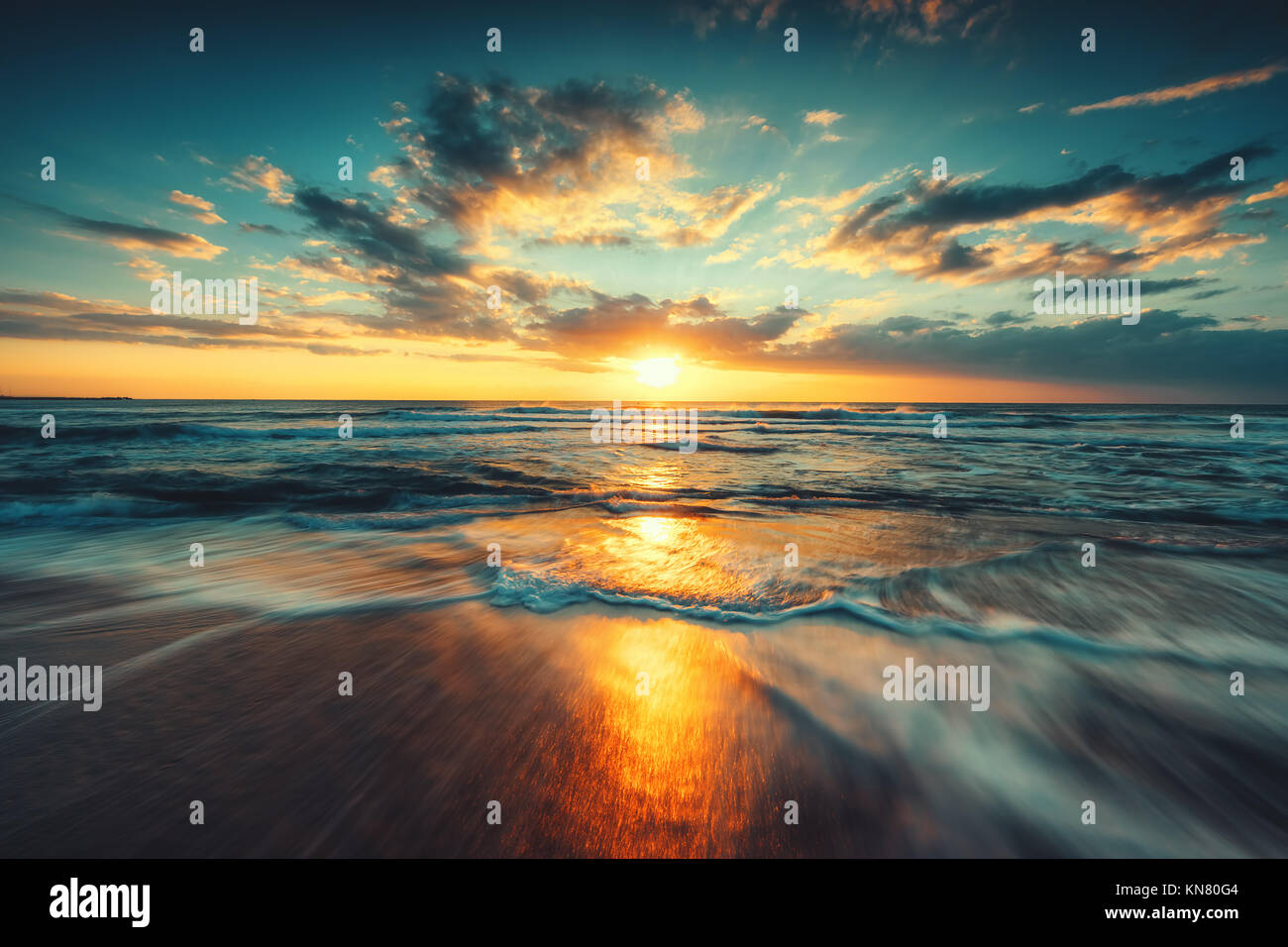 Beautiful cloudscape over the sea, sunrise shot Stock Photo - Alamy