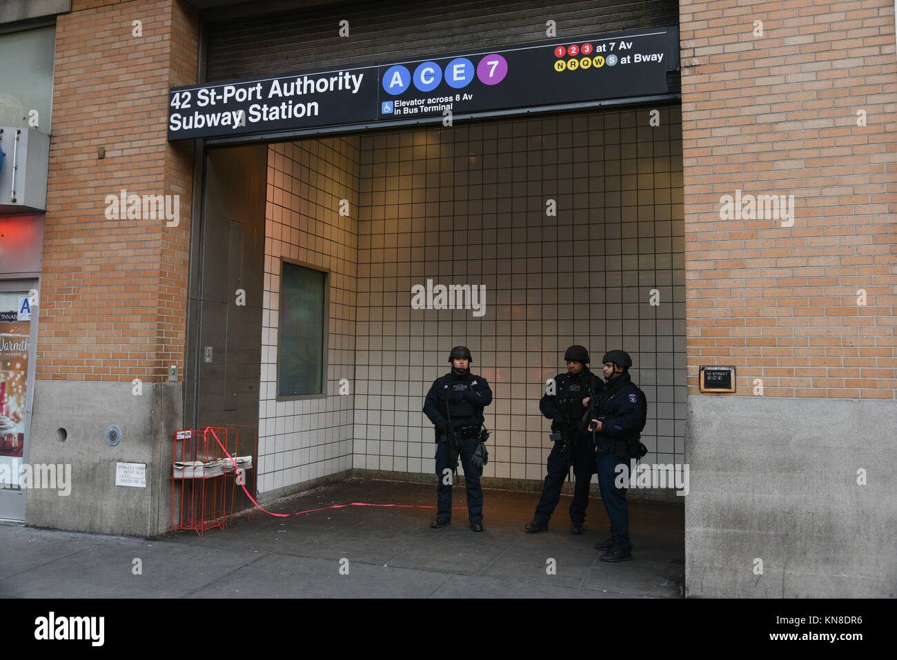 New York, USA. 11th December, 2017. Law enforcement outside the Port Authority Bus Terminal after reports of an explosion on December 11, 2017 in New York. Credit: Erik Pendzich/Alamy Live News Stock Photo