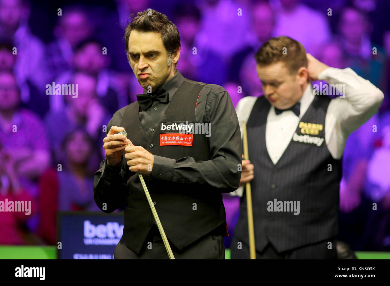 Ronnie O'Sullivan and Shaun Murphy at the table during day thirteen of