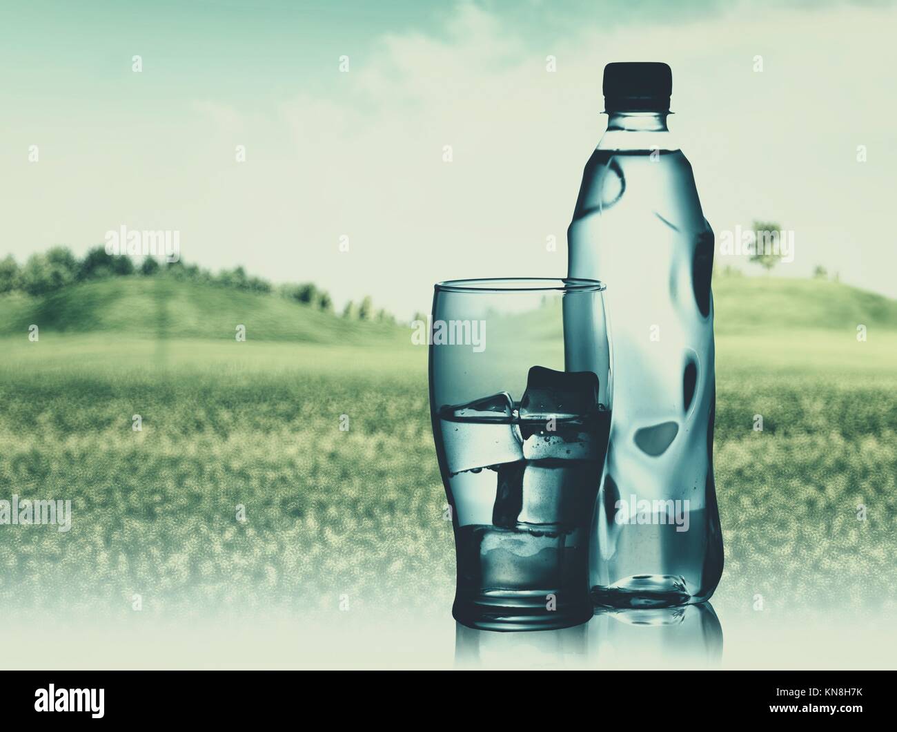 Bottled spring mineral water against abstract natural backgrounds Stock