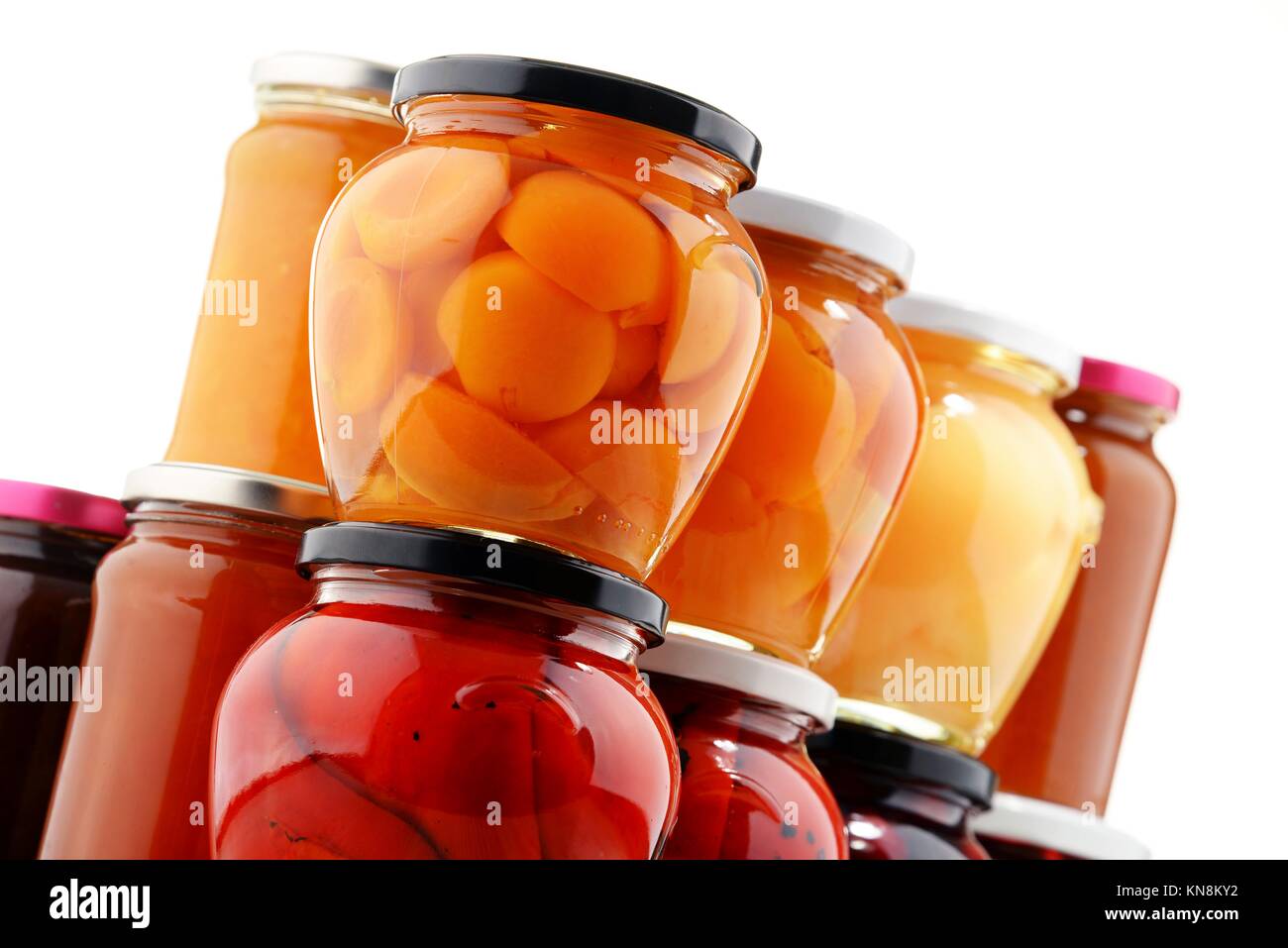Jars with fruity compotes and jams. Preserved fruits Stock Photo Alamy