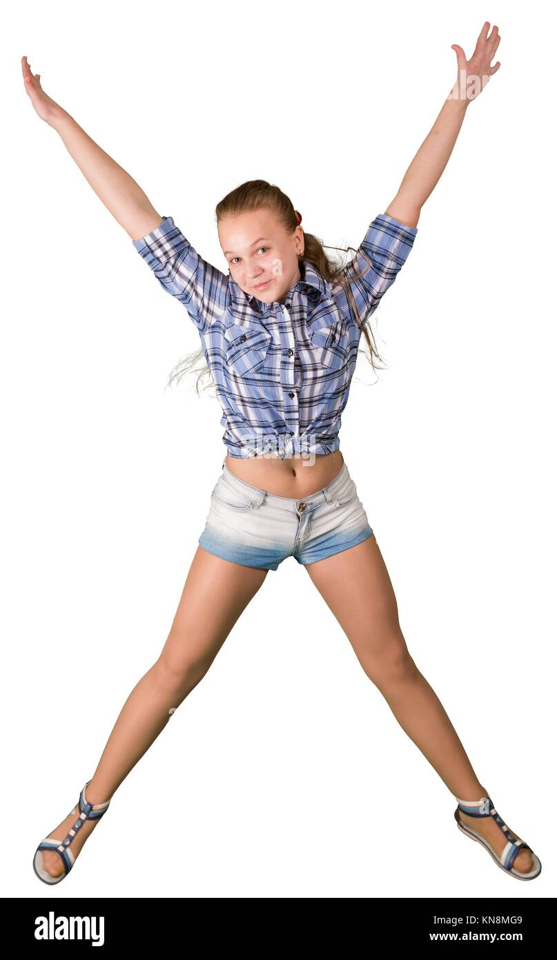Teen girl in shorts jumping isolated on white. Stock Photo