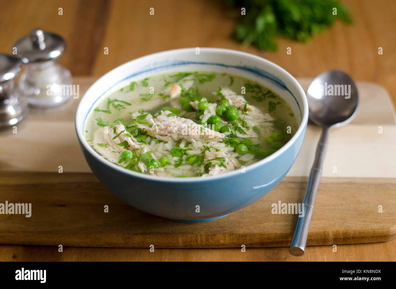 Chicken and pea broth with orzo pasta Stock Photo Alamy