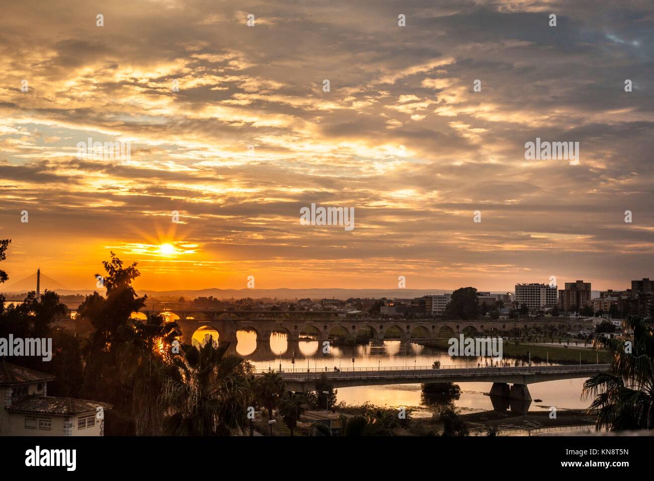 Four bridges of Badajoz City at sunset with cloudy sky, Spain. Stock Photo