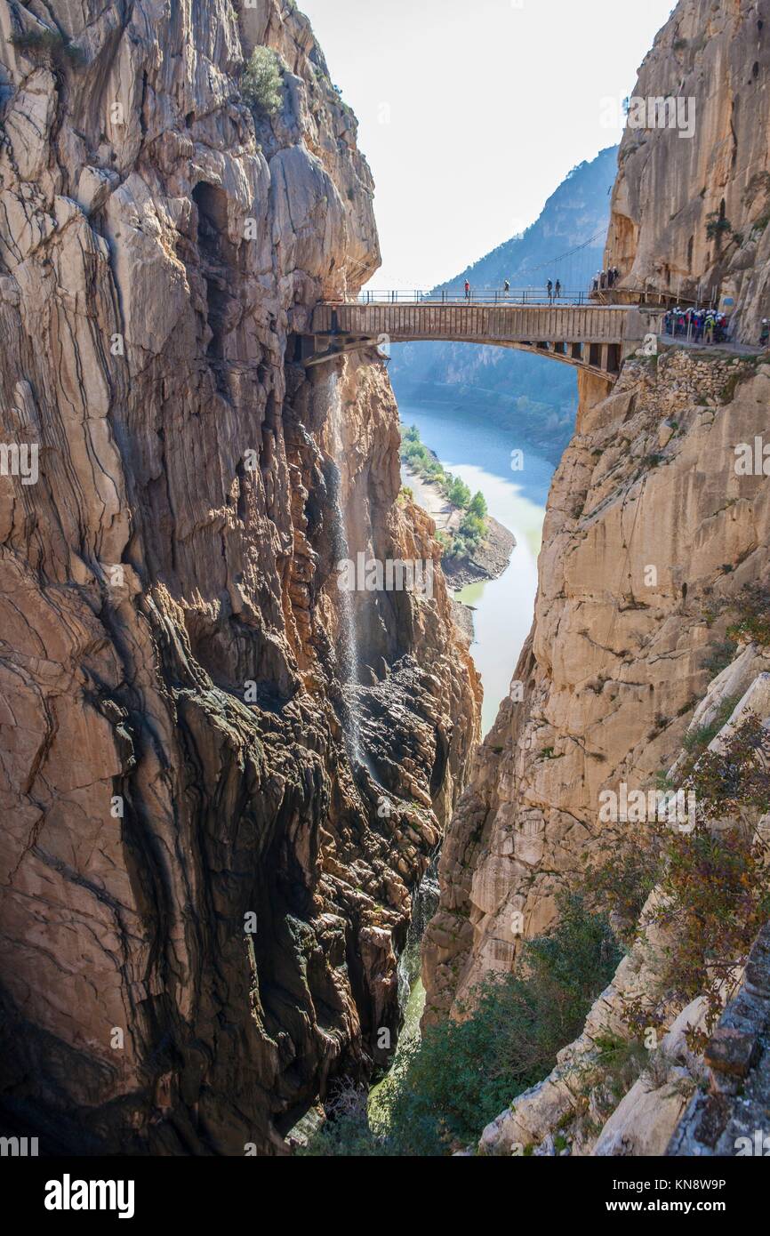 Visitors crossing the suspension bridge at Gaitanes Gorge, Malaga, Spain. Stock Photo