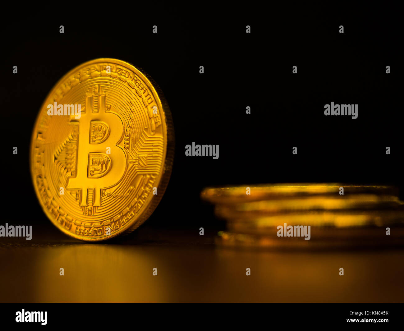 Golden bitcoin cryptocurrency banking money transfer business technology with black background. Concept of distributed ledger technology and digital e Stock Photo